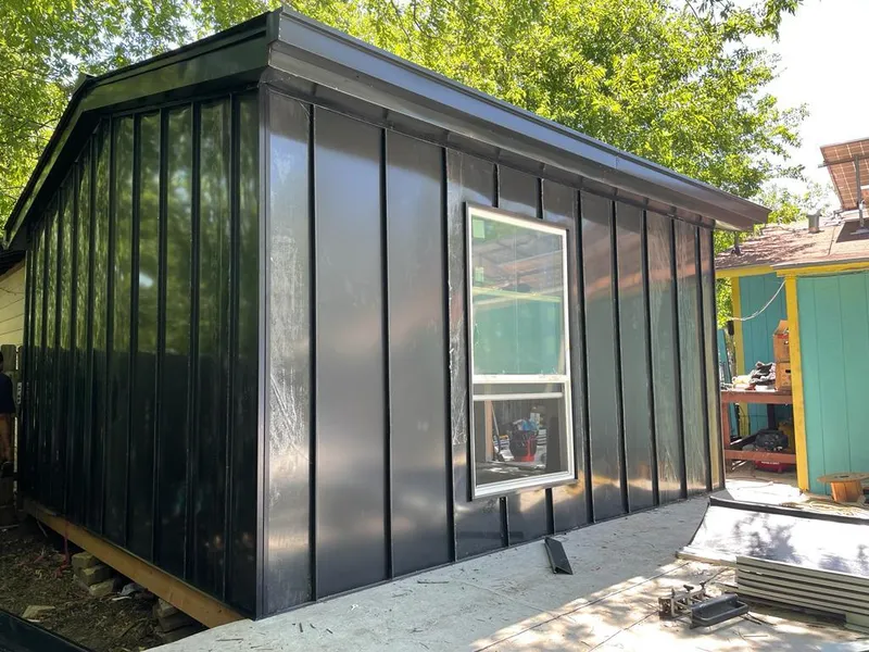 Black standing seam metal wall panels for Roof Inspection in Bridgeton